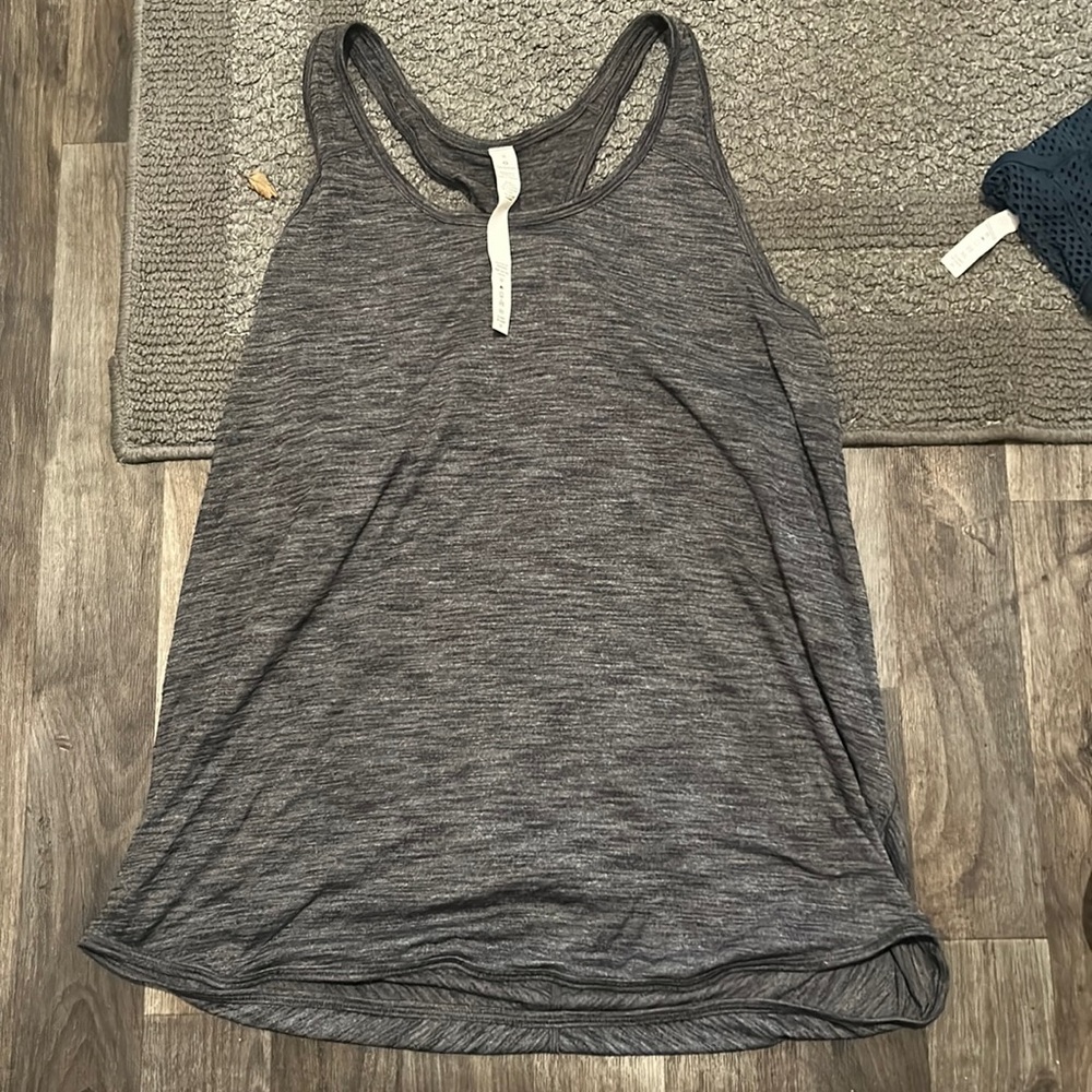 Grey tank top. Loose fitting